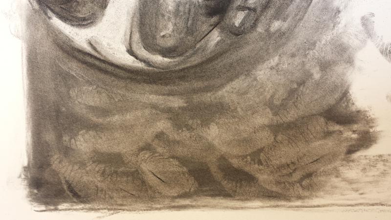 Detail of a black-and-white charcoal drawing showing handprint texture